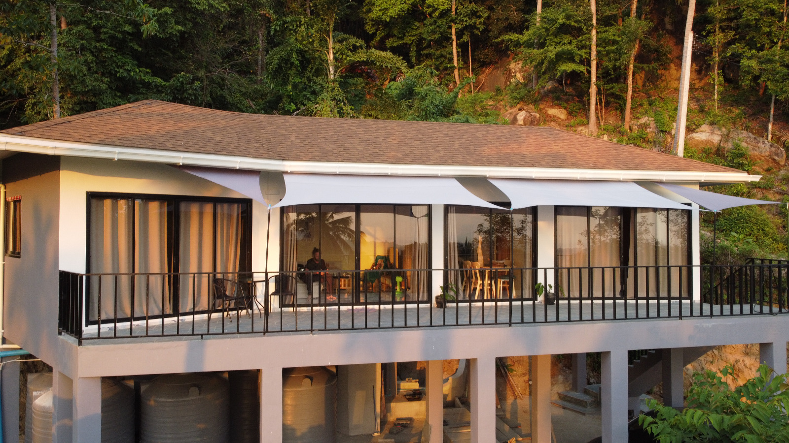 Villa exterior with shaded balcony