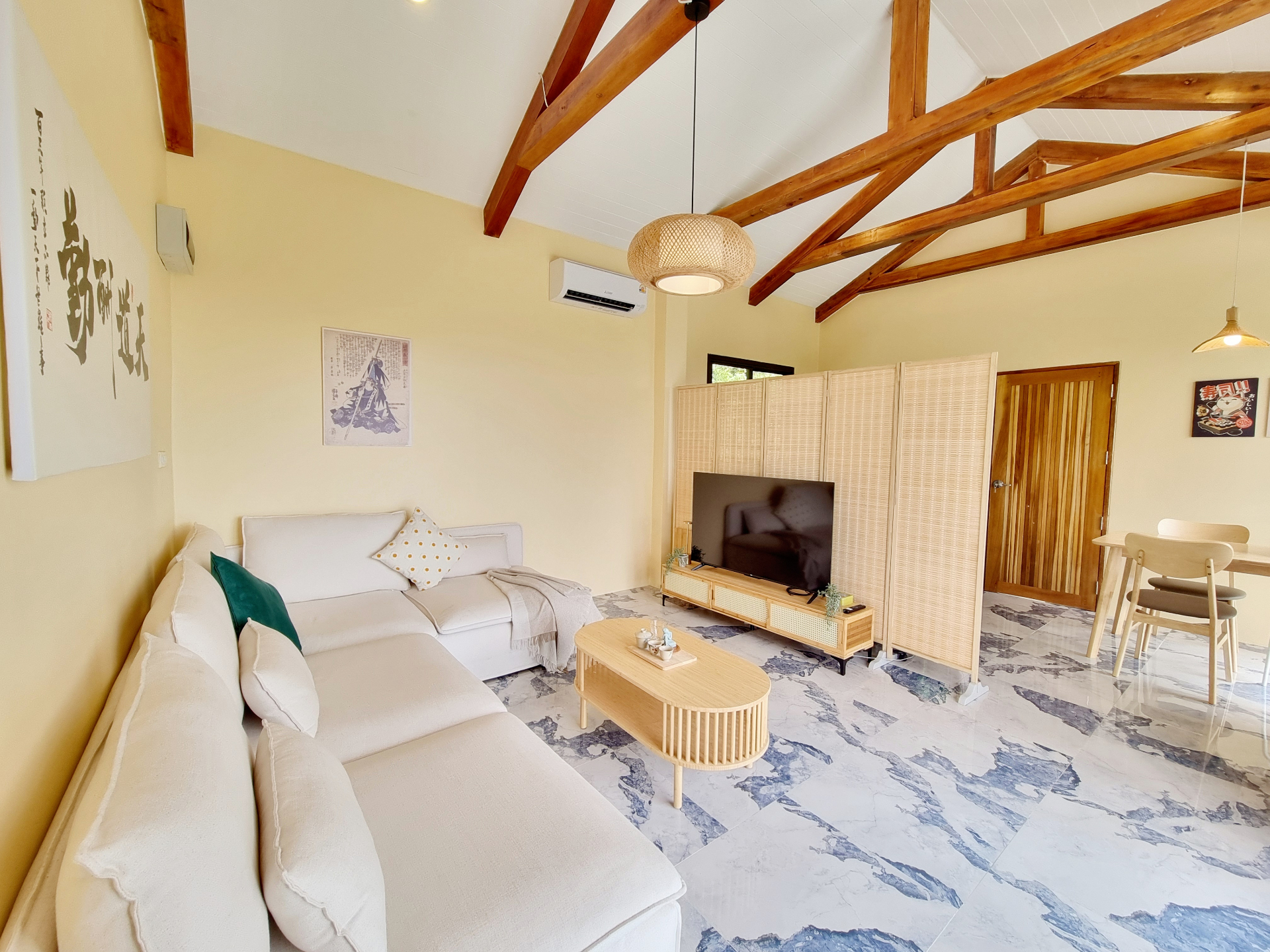 Bright living room with wooden beams